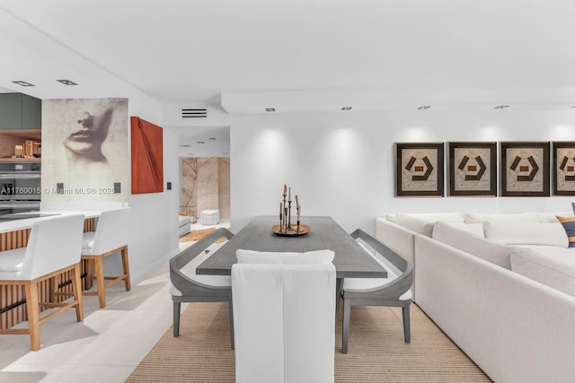 dining area featuring visible vents