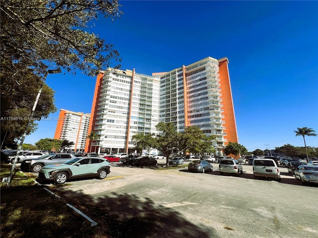 view of property with uncovered parking