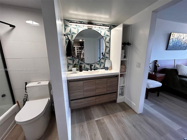 1351 NE Miami Gardens Dr Unit 325E, Miami, FL 33179 - ensuite bathroom featuring vanity, ensuite bath, toilet, and wood finished floors