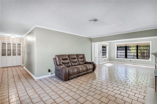 tiled living room featuring visible vents, a textured ceiling, baseboards, and ornamental molding