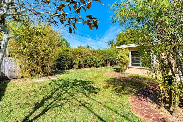 view of yard featuring fence