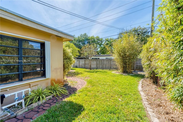 view of yard with fence