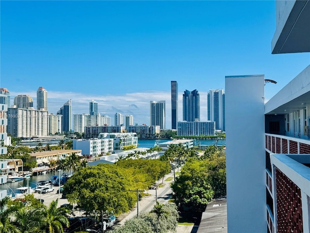 property's view of city featuring a water view