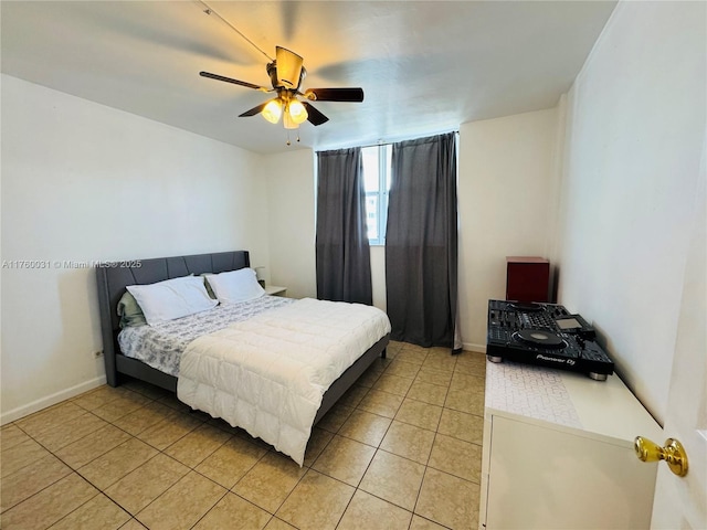 3660 NE 166th St Unit 812, North Miami Beach, FL 33160 - bedroom with light tile patterned floors, baseboards, and ceiling fan