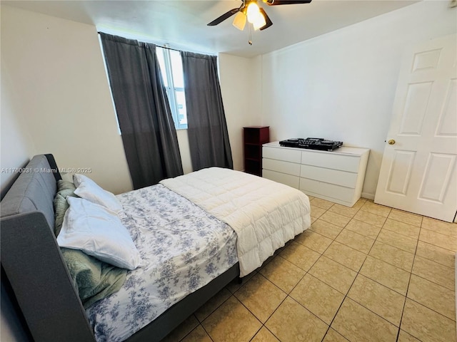 3660 NE 166th St Unit 812, North Miami Beach, FL 33160 - bedroom featuring light tile patterned floors and ceiling fan