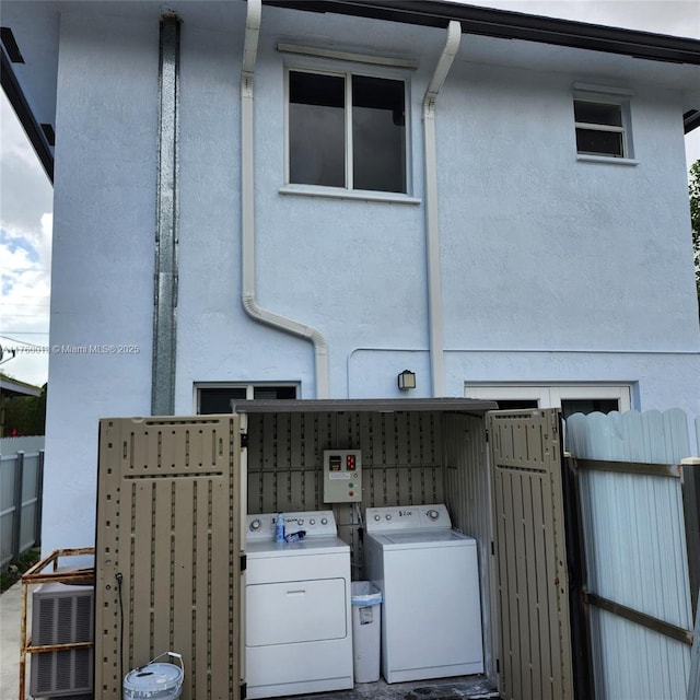 laundry area featuring washing machine and dryer and laundry area