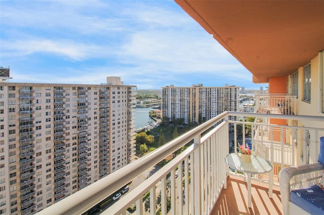 balcony featuring a water view
