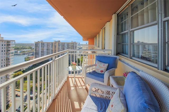 balcony featuring a city view