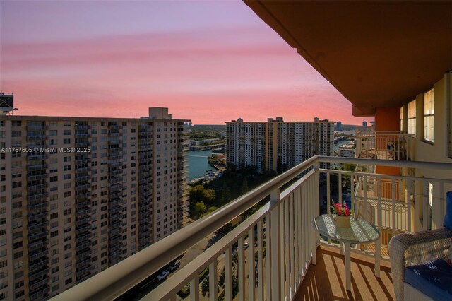 aerial view featuring a view of city and a water view