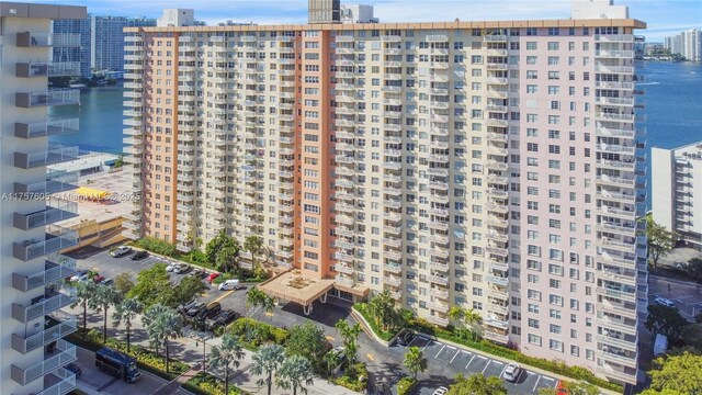 251 174th St Unit 2307, Sunny Isles Beach, FL 33160 - view of property with a water view, a city view, and uncovered parking