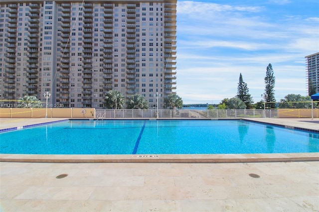 community pool with fence