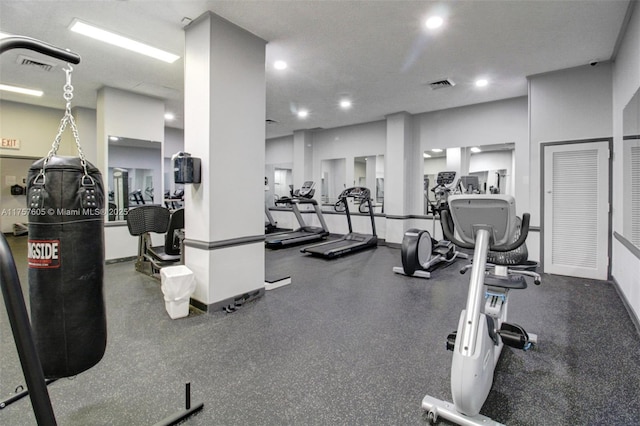 workout area with visible vents and recessed lighting