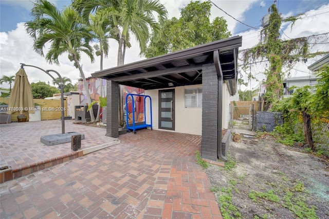 view of patio / terrace with a gate and fence