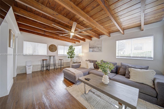 living area featuring beam ceiling, wood ceiling, ceiling fan, and hardwood / wood-style floors