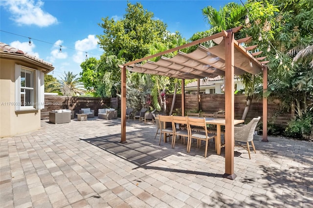 view of patio / terrace featuring a fenced backyard, an outdoor hangout area, outdoor dining space, and a pergola