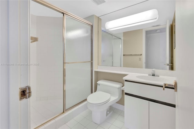 bathroom featuring visible vents, toilet, a stall shower, tile patterned floors, and vanity