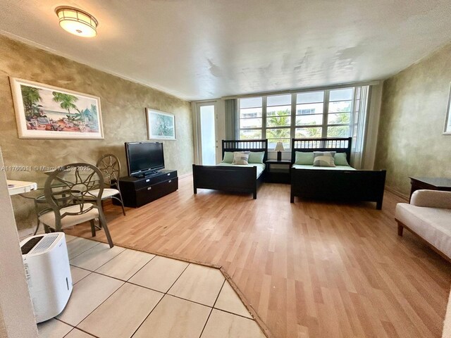100 Lincoln Rd Unit 329, Miami Beach, FL 33139 - living area with light wood-style floors