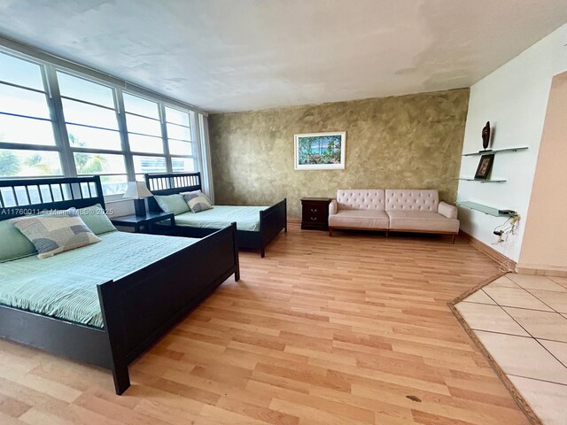 100 Lincoln Rd Unit 329, Miami Beach, FL 33139 - bedroom with light wood-type flooring and baseboards
