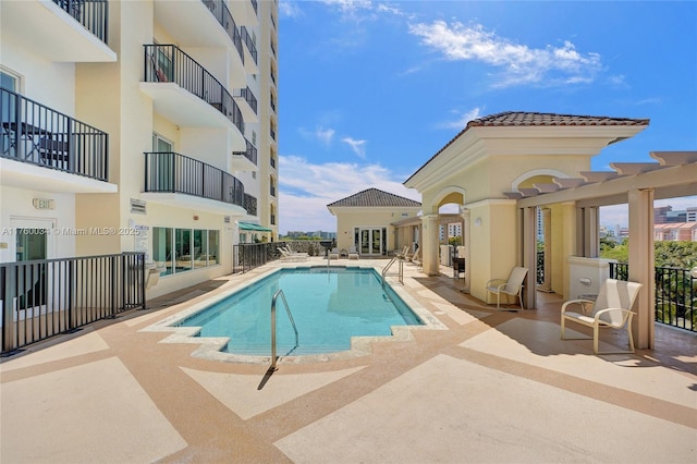 pool with a patio