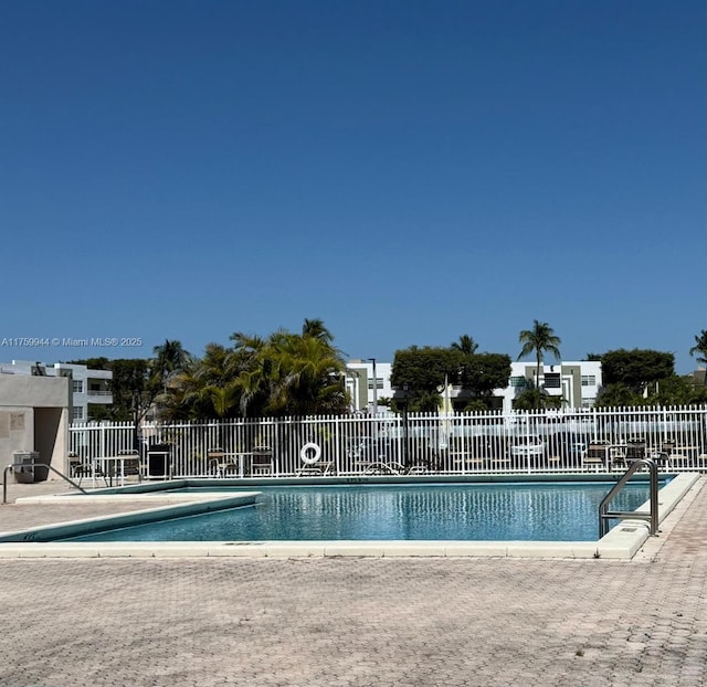 community pool with fence