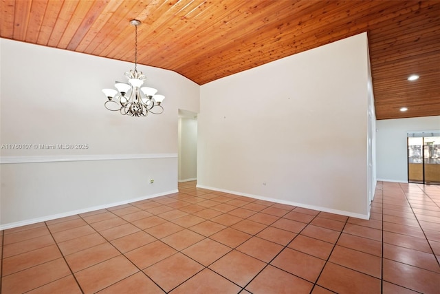 empty room with a chandelier, baseboards, wooden ceiling, and vaulted ceiling