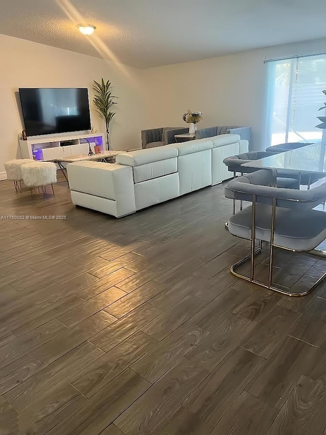 living room featuring dark wood finished floors