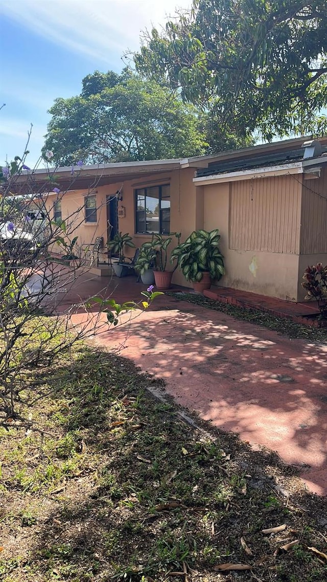 exterior space with a patio area