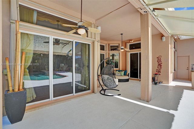 view of patio / terrace featuring a ceiling fan