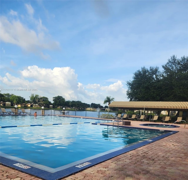 community pool featuring a patio area