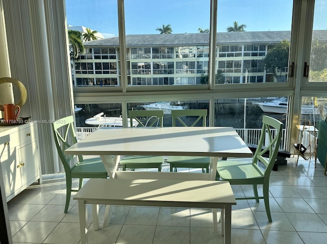 sunroom / solarium featuring a healthy amount of sunlight