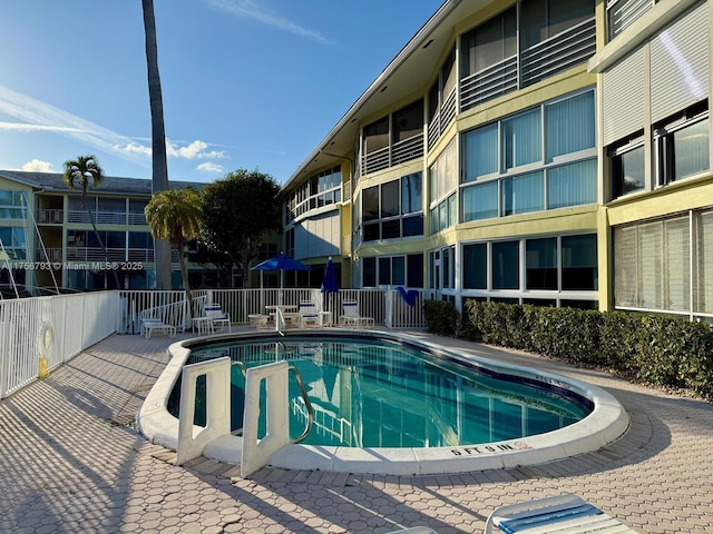 pool featuring fence