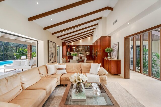 5780 Magnolia Ln, Coral Gables, FL 33156 - living area featuring beamed ceiling, high vaulted ceiling, recessed lighting, and light colored carpet