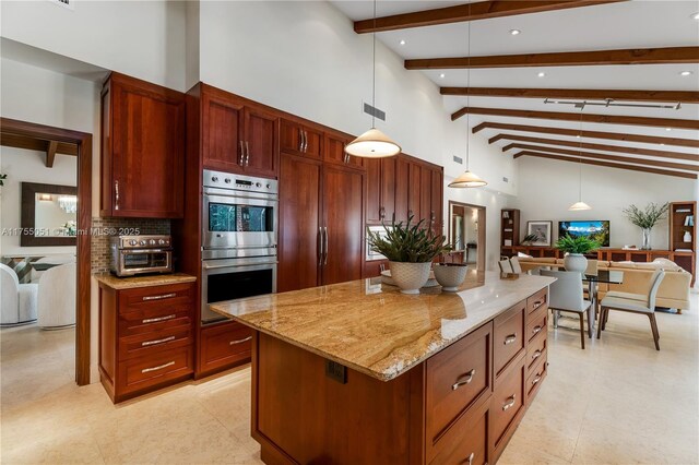 5780 Magnolia Ln, Coral Gables, FL 33156 - kitchen featuring stainless steel double oven, light stone countertops, beam ceiling, decorative light fixtures, and open floor plan