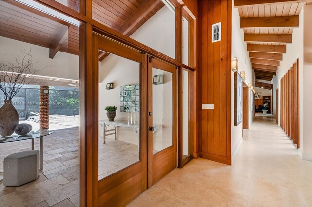 5780 Magnolia Ln, Coral Gables, FL 33156 - doorway to outside featuring beam ceiling, wooden ceiling, french doors, and baseboards
