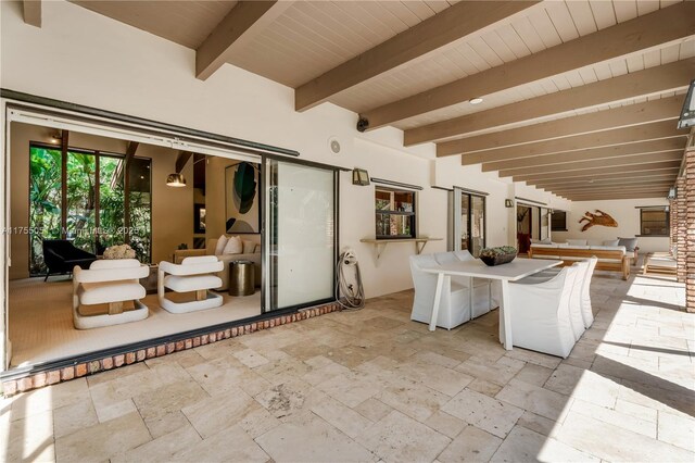 5780 Magnolia Ln, Coral Gables, FL 33156 - view of patio / terrace with outdoor lounge area