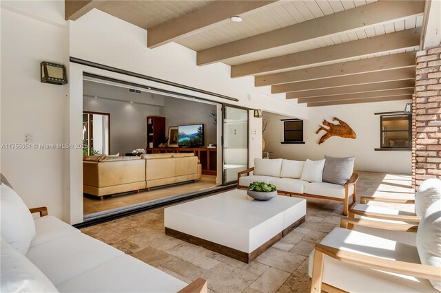 5780 Magnolia Ln, Coral Gables, FL 33156 - living area featuring beamed ceiling and wood ceiling
