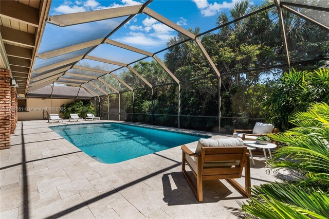 5780 Magnolia Ln, Coral Gables, FL 33156 - outdoor pool featuring a patio area and glass enclosure