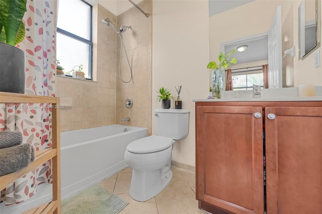 full bathroom with tile patterned floors, toilet, shower / bath combination, baseboards, and vanity