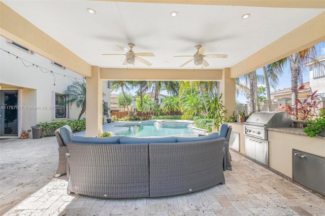 view of patio with fence, grilling area, exterior kitchen, a fenced in pool, and ceiling fan