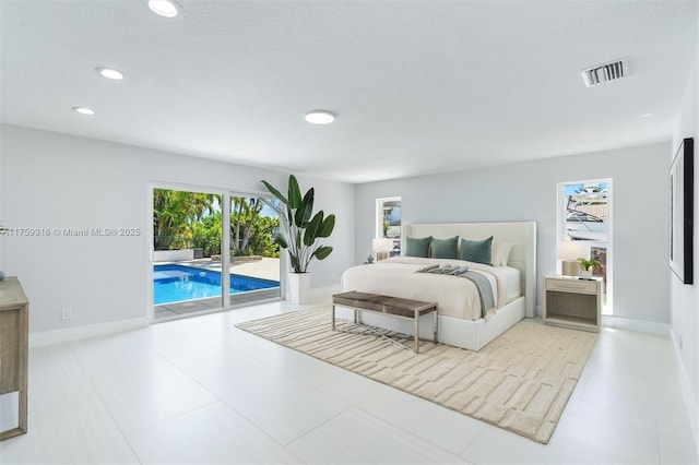 bedroom with visible vents, recessed lighting, baseboards, and access to outside