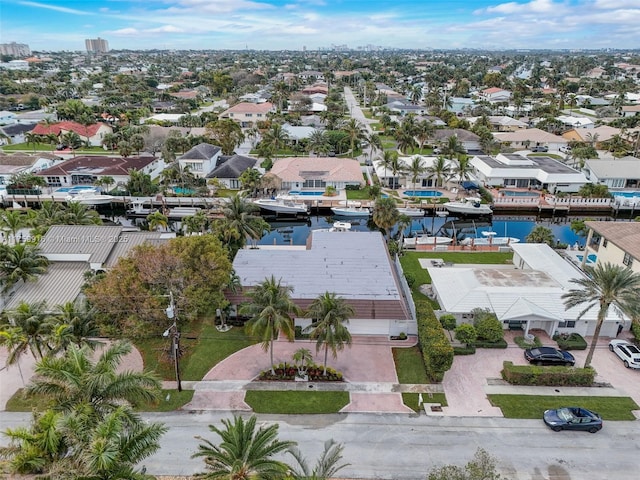 aerial view featuring a residential view and a water view