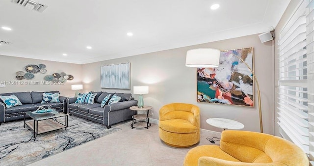 living room with light tile patterned floors, visible vents, recessed lighting, and baseboards