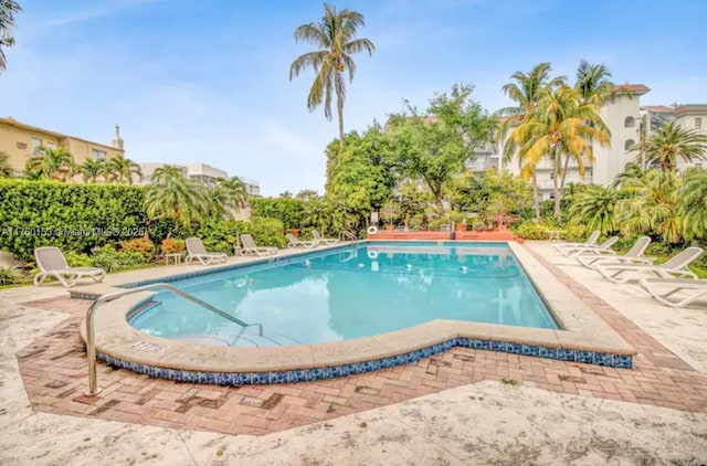 pool with a patio