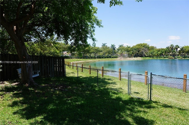 water view featuring a gate and fence