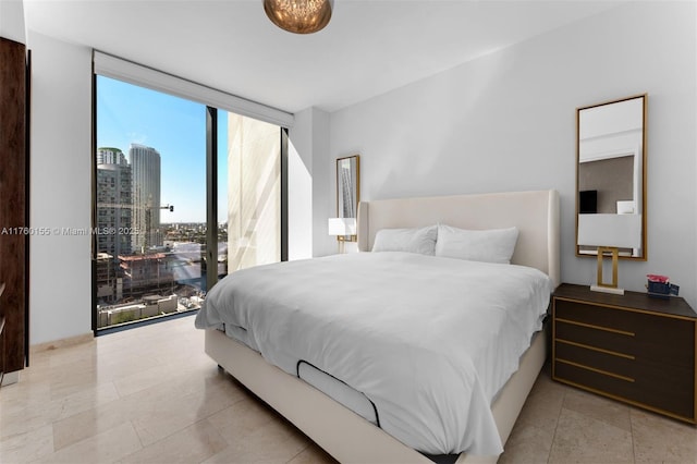68 SE 6th St Unit 1404, Miami, FL 33131 - bedroom featuring a city view and expansive windows