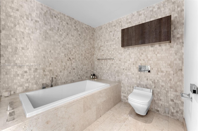 68 SE 6th St Unit 1404, Miami, FL 33131 - bathroom featuring tile walls, toilet, and a bath