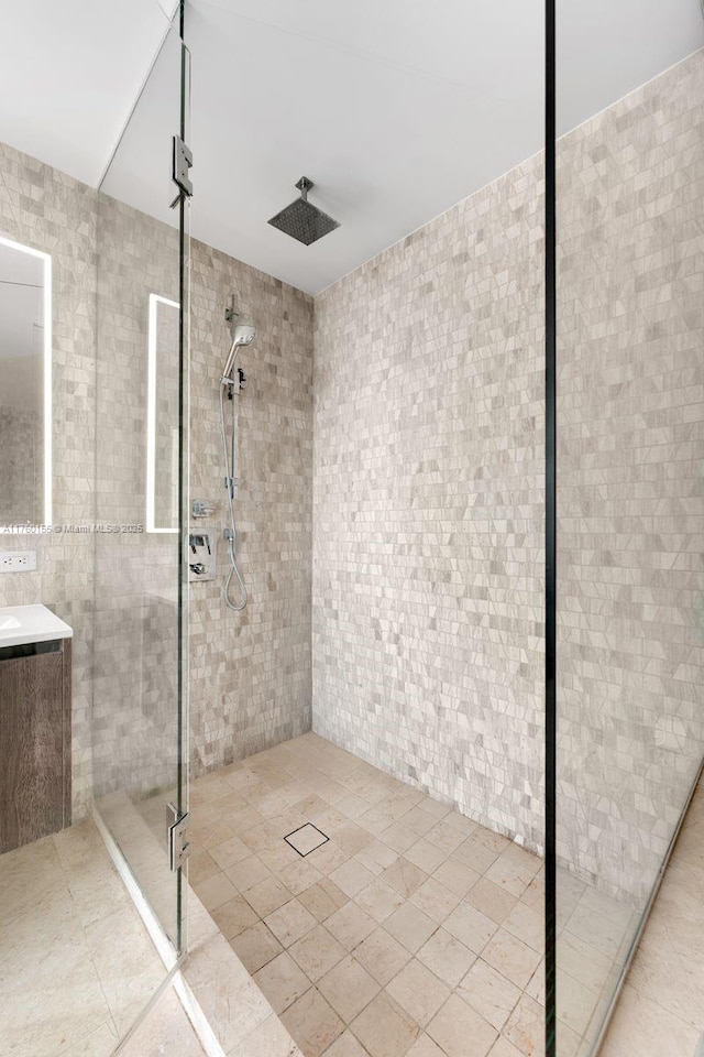 68 SE 6th St Unit 1404, Miami, FL 33131 - bathroom with a stall shower