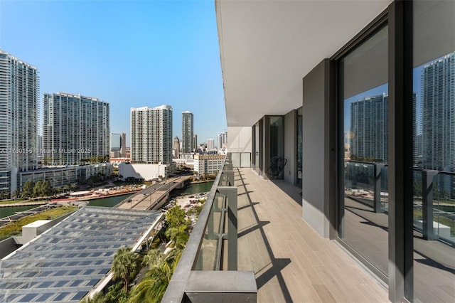 68 SE 6th St Unit 1404, Miami, FL 33131 - balcony with a city view and a water view