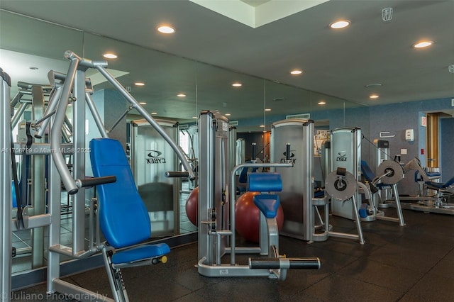 workout area with recessed lighting