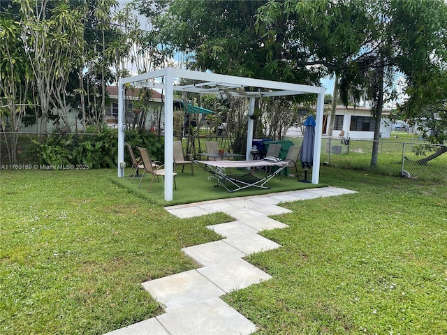 view of yard with a playground and fence